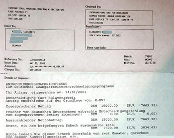 Payment Notification from the International Organization for Migration (IOM) of the first compensation payment, 2002.